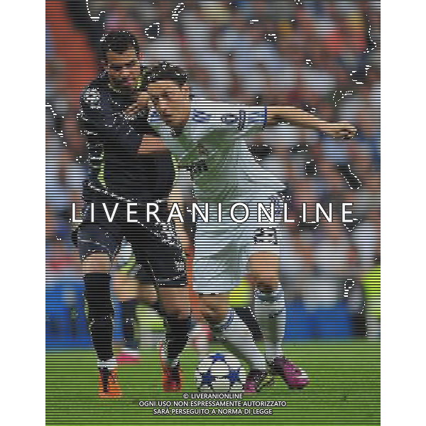 MADRID, April 6, 2011 () Real Madrid\'s Mesut Ozil (R) competes during the first match of the 2010/11 UEFA Champions League quarter final against Tottenham Hotspur at Santiago Bernabeu Stadium in Madrid on April 6, 2011. Real Madrid won 4 0. (/Chen Haitong)(bxf) UEFA Champions League 2010/11 Quarti di finale Real Madrid vs Tottenham AG. ALDO LIVERANI SAS ITALY ONLY *** Local Caption *** .