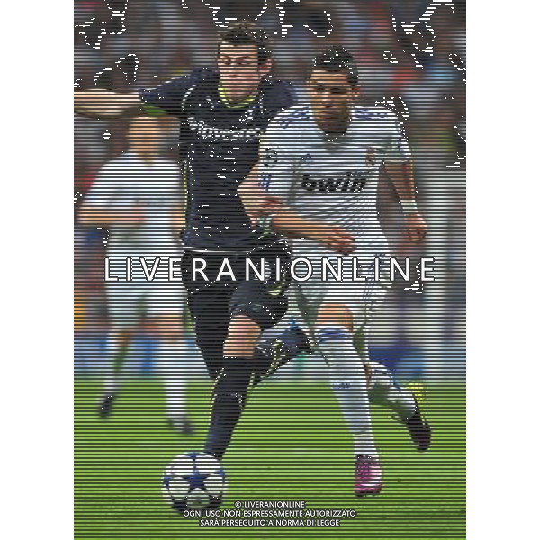 MADRID, April 6, 2011 () Real Madrid\'s Cristiano Ronaldo (R) competes during the first match of the 2010/11 UEFA Champions League quarter final against Tottenham Hotspur at Santiago Bernabeu Stadium in Madrid on April 6, 2011. Real Madrid won 4 0. (/Chen Haitong)(bxf) UEFA Champions League 2010/11 Quarti di finale Real Madrid vs Tottenham AG. ALDO LIVERANI SAS ITALY ONLY *** Local Caption *** .