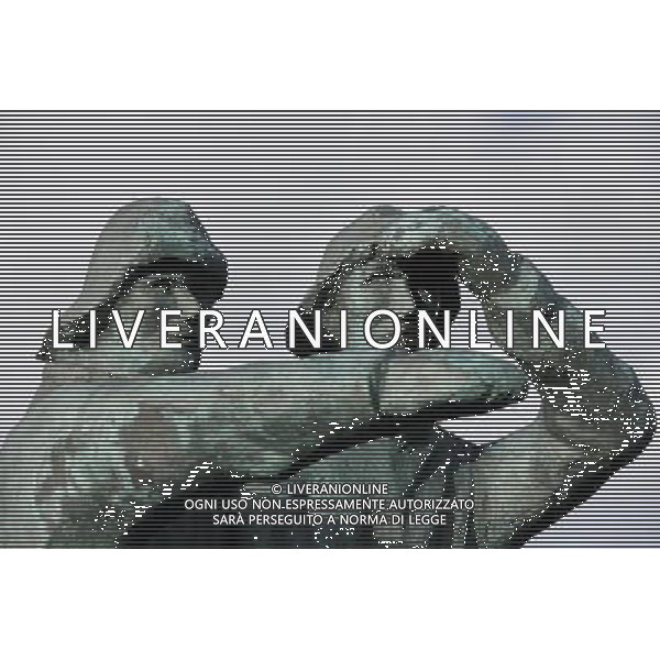 A sculpture of two fishermen in the old harbour of ReykjavÕk, Iceland, 6 April 2011. Recovering from the financial crisis the country will vote on a referendum on 9 April 2011 wether to accept the conditions to pay back the debt of millions to the UK. A previous referendum on 6 March 2010 regarding a previous offer made by the United Kingdom and the Netherlands was defeated, with 93% voting against and less than 2% in favor of agreeing to the terms. Vedute ed immagini dell\' Islanda , con capitale Reykjavik la cui economia  \' saltata \' per colpa della crisi finanziaria che ha colpito l\'intera Europa AG.ALDO LIVERANI SAS ITALY ONLY *** Local Caption *** .