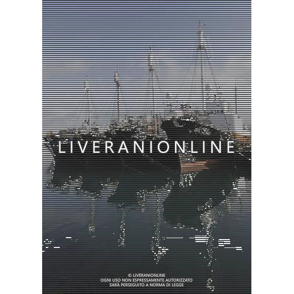 Fishing ships docked in the old harbour of ReykjavÕk, Iceland, 6 April 2011. Recovering from the financial crisis the country will vote on a referendum on 9 April 2011 wether to accept the conditions to pay back the debt of millions to the UK. A previous referendum on 6 March 2010 regarding a previous offer made by the United Kingdom and the Netherlands was defeated, with 93% voting against and less than 2% in favor of agreeing to the terms. Vedute ed immagini dell\' Islanda , con capitale Reykjavik la cui economia  \' saltata \' per colpa della crisi finanziaria che ha colpito l\'intera Europa AG.ALDO LIVERANI SAS ITALY ONLY *** Local Caption *** .