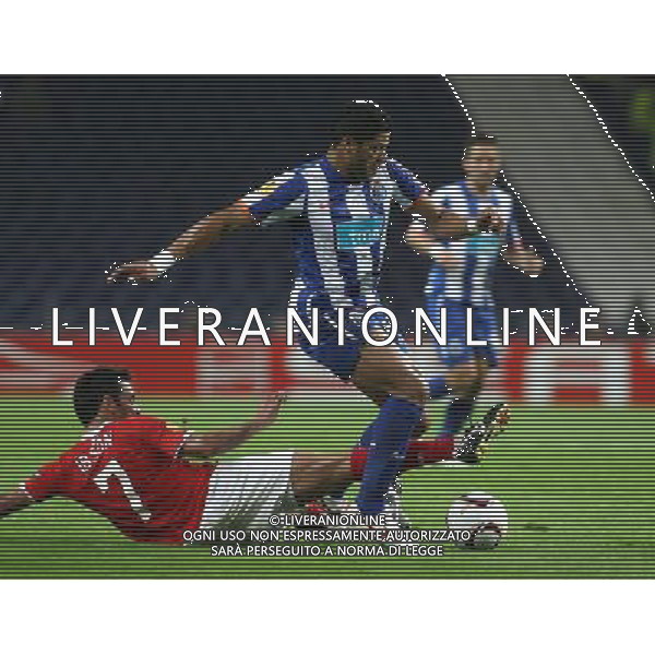 20110407: PORTO, PORTUGAL - FC Porto vs Spartak Moscow: UEFA Europa League 2010/2011 - Quarter-Finals, First Leg. In picture: Hulk (Porto) and Ibson (Spartak). PHOTO: Manuel Azevedo/CITYFILES AG ALDO LIVERANI ONLY ITALY