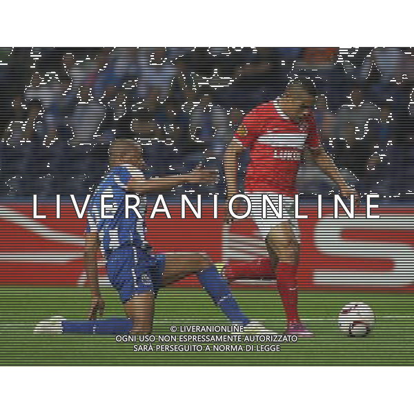 20110407: PORTO, PORTUGAL - FC Porto vs Spartak Moscow: UEFA Europa League 2010/2011 - Quarter-Finals, First Leg. In picture: Welliton Morais (Spartak) and Fernando (Porto). PHOTO: Manuel Azevedo/CITYFILES AG ALDO LIVERANI ONLY ITALY