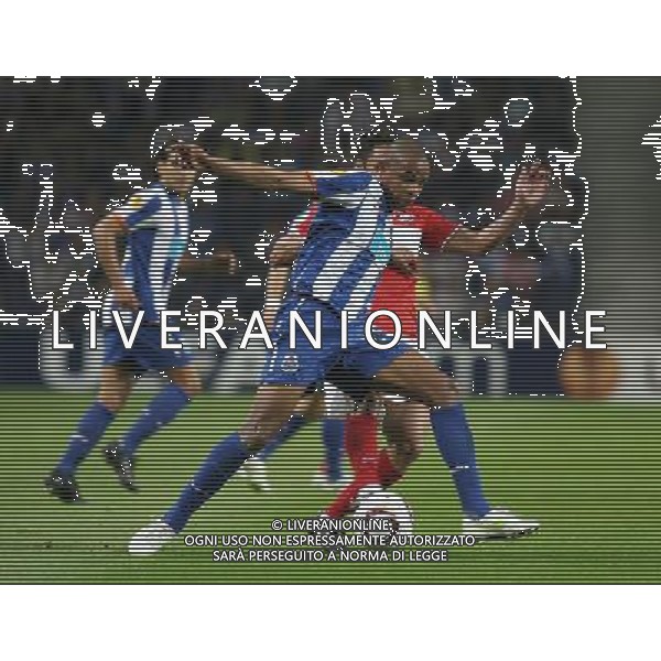 20110407: PORTO, PORTUGAL - FC Porto vs Spartak Moscow: UEFA Europa League 2010/2011 - Quarter-Finals, First Leg. In picture: Fernando (Porto) and Ibson (Spartak). PHOTO: Manuel Azevedo/CITYFILES AG ALDO LIVERANI ONLY ITALY