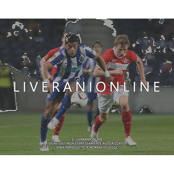 20110407: PORTO, PORTUGAL - FC Porto vs Spartak Moscow: UEFA Europa League 2010/2011 - Quarter-Finals, First Leg. In picture: Hulk (Porto) and Evgeni Makeyev (Spartak). PHOTO: Manuel Azevedo/CITYFILES AG ALDO LIVERANI ONLY ITALY