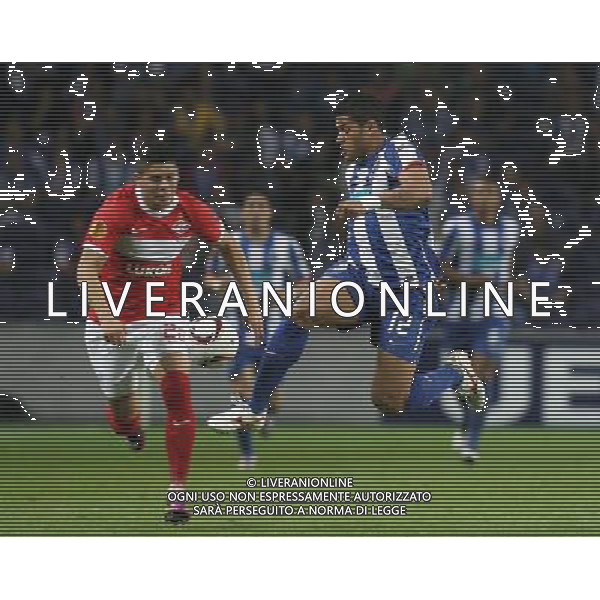 20110407: PORTO, PORTUGAL - FC Porto vs Spartak Moscow: UEFA Europa League 2010/2011 - Quarter-Finals, First Leg. In picture: Hulk (Porto) and Marcos Rojo (Spartak). PHOTO: Manuel Azevedo/CITYFILES AG ALDO LIVERANI ONLY ITALY
