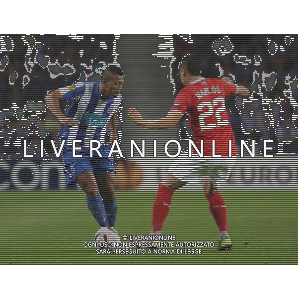 20110407: PORTO, PORTUGAL - FC Porto vs Spartak Moscow: UEFA Europa League 2010/2011 - Quarter-Finals, First Leg. In picture: Fredy Guarin (Porto) and Marcos Rojo (Spartak). PHOTO: Manuel Azevedo/CITYFILES AG ALDO LIVERANI ONLY ITALY