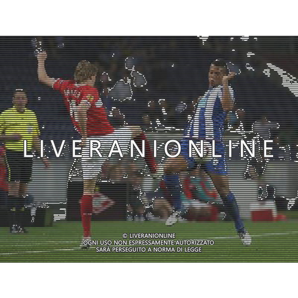 20110407: PORTO, PORTUGAL - FC Porto vs Spartak Moscow: UEFA Europa League 2010/2011 - Quarter-Finals, First Leg. In picture: Fredy Guarin (Porto) and Evgeniy Makeyev (Spartak). PHOTO: Manuel Azevedo/CITYFILES AG ALDO LIVERANI ONLY ITALY
