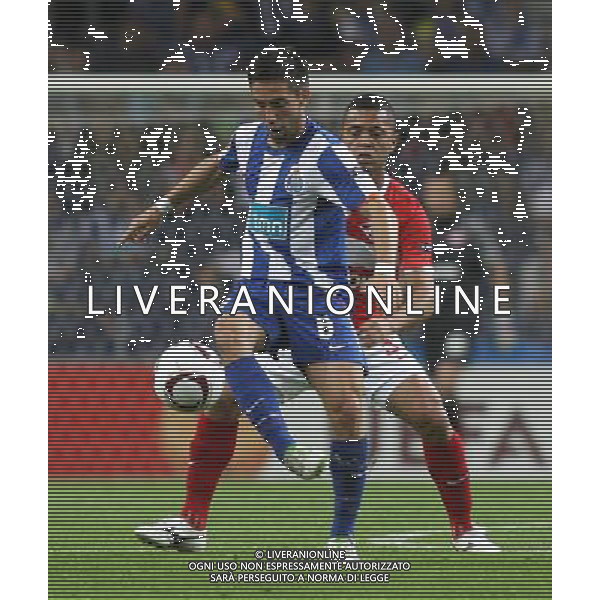 20110407: PORTO, PORTUGAL - FC Porto vs Spartak Moscow: UEFA Europa League 2010/2011 - Quarter-Finals, First Leg. In picture: Joao Moutinho (Porto) and Rafael Carioca (Spartak) . PHOTO: Manuel Azevedo/CITYFILES AG ALDO LIVERANI ONLY ITALY