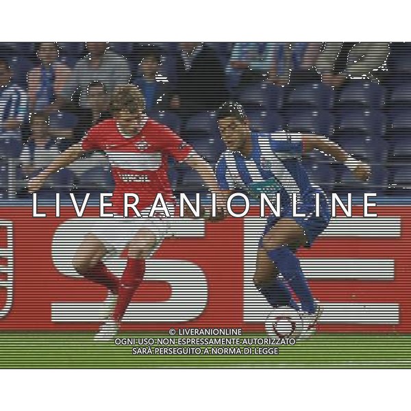 20110407: PORTO, PORTUGAL - FC Porto vs Spartak Moscow: UEFA Europa League 2010/2011 - Quarter-Finals, First Leg. In picture: Hulk (Porto) and Evgeni Makeyev (Spartak). PHOTO: Manuel Azevedo/CITYFILES AG ALDO LIVERANI ONLY ITALY