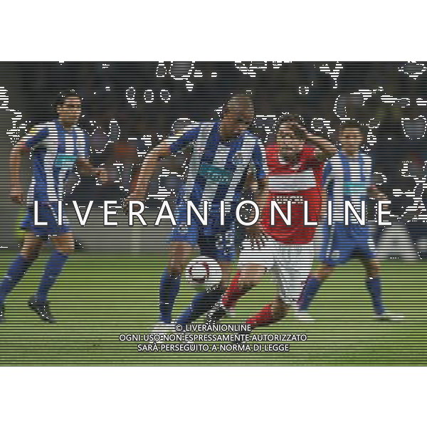 20110407: PORTO, PORTUGAL - FC Porto vs Spartak Moscow: UEFA Europa League 2010/2011 - Quarter-Finals, First Leg. In picture: Fernando (Porto) and Ibson (Spartak). PHOTO: Manuel Azevedo/CITYFILES AG ALDO LIVERANI ONLY ITALY