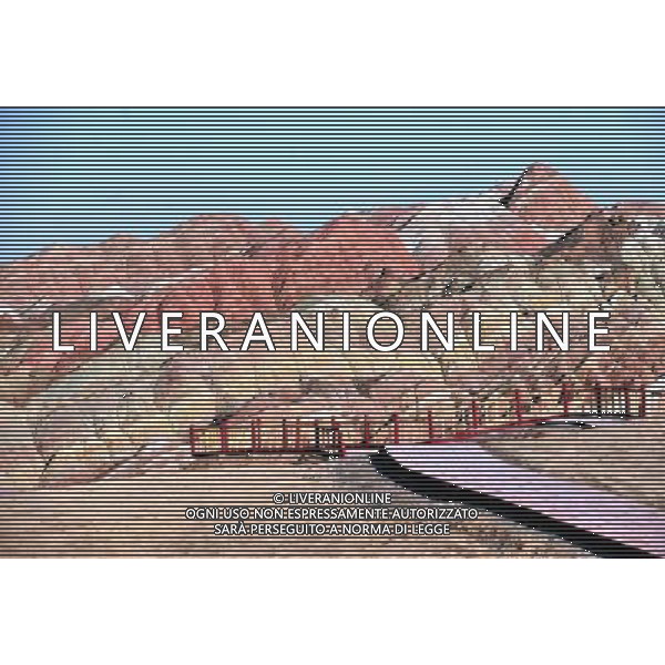 (110412) ZHANGYE, April 12, 2011 () Danxia landform is seen at a geopark near Zhangye, northwest China\'s Gansu Province, April 11, 2011. Danxia, which means \'rosy cloud,\' is a special landform formed from reddish sandstone that has been eroded over time into a series of mountains surrounded by curvaceous cliffs and many unusual rock formations. (/Gao Jianjun) (lfj) Geoparco a Zhangye , morfologia Danxia che significa \'nuvola rosa\',  una morfologia speciale formata da arenaria rossastra che  stata erosa nel tempo in una serie di montagne circondate da pareti curve formazioni rocciose insolite AG. ALDO LIVERANI SAS ITALY ONLY *** Local Caption *** .