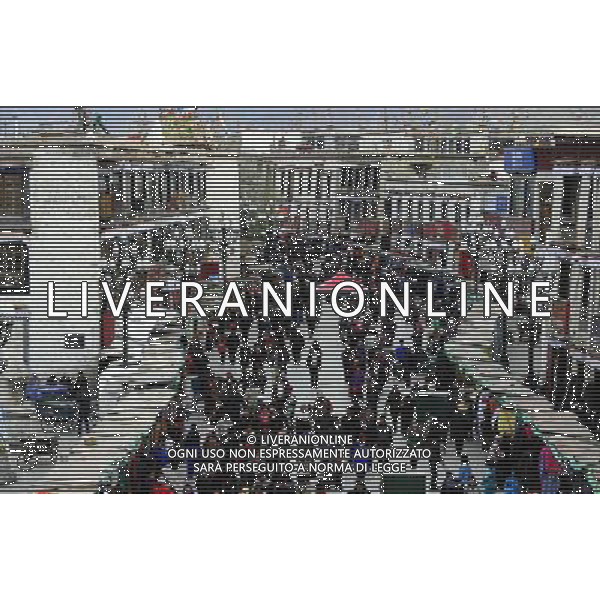 (110414) LHASA, April 14, 2011 () Photo taken on April 7, 2011 shows the crowded Parkhor West Street, in Lhasa, capital of southwest China\'s Tibet Autonomous Region. As one of the most distinct and attractive old blocks in the world, Parkhor Street is unique with contrastive features and stunning diversity. It is a place where Tibetan tradition meets modern fashion, religious sanctity mixes with commercial prosperity. Located in the center of Lhasa, surrounding the Jokhang Temple, it covers an area of 133.82 hectares and has 35 small streets and alleys extending in all directions. The Tibetan word Parkhor literally means \'an annular worshipping road\', which refers to the main street of the block. The main street, about two kilometers long, functions as the most important road for pilgrimage, local business, and tourism. In its 1400 years\' long history, Parkhor Street has witnessed the eclipse and prosperity of Buddhism, the exchange and fusion of the diverse cultures, the flourishing of ancient trade, the continuous changes of the regimes, and the ups and downs of Lhasa. Because of its unmatched location and cultural signification, Parkhor Street has long been considered as the epitome of Lhasa\'s historical development. It is the earliest and most prosperous business street in the city, crowded with merchants from all over China and even foreign countries such as Nepal and India, selling craftworks and products with rich ethnical features. Since the peaceful liberation of Tibet, the Parkhor Street has undergone fundamental changes. Common people moved into the former residence of noble families, handcraft workshops and stores appeared one after another, and shabby street infrastructure were thoroughly renovated. Along with China\'s Reform and Opening Up, the Parkhor Street in 1980\'s and 1990\'s saw a rise of commerce with increasing shops and abundant commodities. Tibetan artworks and craftworks gradually went popular in the market. Thereafter, th AG ALDO LIVERANI ONLY ITALY