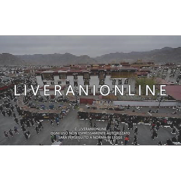 (110414) LHASA, April 14, 2011 () Photo taken on April 7, 2011 shows numerous stalls on the Parkhor Street around Jokhang Temple, in Lhasa, capital of southwest China\'s Tibet Autonomous Region. As one of the most distinct and attractive old blocks in the world, Parkhor Street is unique with contrastive features and stunning diversity. It is a place where Tibetan tradition meets modern fashion, religious sanctity mixes with commercial prosperity. Located in the center of Lhasa, surrounding the Jokhang Temple, it covers an area of 133.82 hectares and has 35 small streets and alleys extending in all directions. The Tibetan word Parkhor literally means \'an annular worshipping road\', which refers to the main street of the block. The main street, about two kilometers long, functions as the most important road for pilgrimage, local business, and tourism. In its 1400 years\' long history, Parkhor Street has witnessed the eclipse and prosperity of Buddhism, the exchange and fusion of the diverse cultures, the flourishing of ancient trade, the continuous changes of the regimes, and the ups and downs of Lhasa. Because of its unmatched location and cultural signification, Parkhor Street has long been considered as the epitome of Lhasa\'s historical development. It is the earliest and most prosperous business street in the city, crowded with merchants from all over China and even foreign countries such as Nepal and India, selling craftworks and products with rich ethnical features. Since the peaceful liberation of Tibet, the Parkhor Street has undergone fundamental changes. Common people moved into the former residence of noble families, handcraft workshops and stores appeared one after another, and shabby street infrastructure were thoroughly renovated. Along with China\'s Reform and Opening Up, the Parkhor Street in 1980\'s and 1990\'s saw a rise of commerce with increasing shops and abundant commodities. Tibetan artworks and craftworks gradually went popular i AG ALDO LIVERANI ONLY ITALY