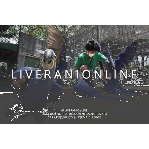 MANILA, 15 aprile 2011 - Uccelli International Inc. (BII) Avicola Park, Breeding and Research Center a Quezon City, Filippine . L\'impianto genera circa 2.000 a 3.000 pappagalli di varie specie annuali, che mira a garantire la conservazione, la conservazione, la sostenibilita\' e la condivisione di specie rare e minacciate di pappagalli. ©Rouelle Umali/ALDO LIVERANI - ITALY ONLY - *** Local Caption *** .