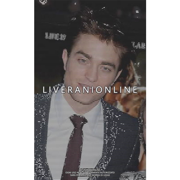  4/17/11 Robert Pattinson at the premiere of \'Water for Elephants\'. (Ziegfeld Theatre, NYC) AG. ALDO LIVERANI SAS ITALY ONLY *** Local Caption *** .