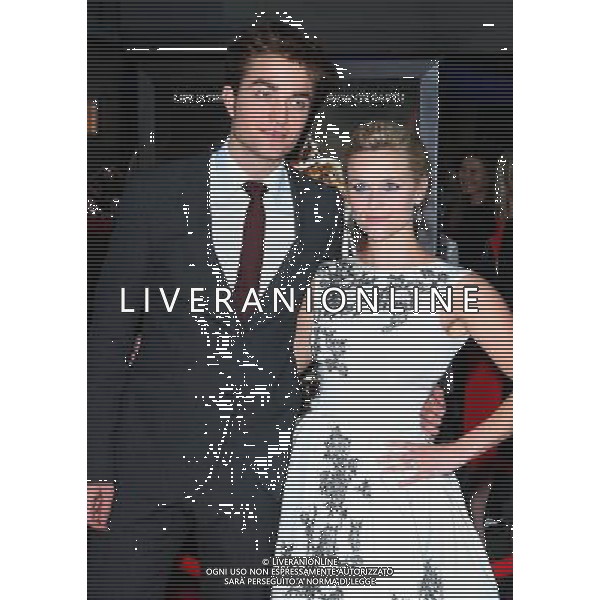  4/17/11 Robert Pattinson and Reese Witherspoon at the premiere of \'Water for Elephants\'. (Ziegfeld Theatre, NYC) AG. ALDO LIVERANI SAS ITALY ONLY *** Local Caption *** .