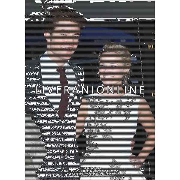  4/17/11 Robert Pattinson and Reese Witherspoon at the premiere of \'Water for Elephants\'. (Ziegfeld Theatre, NYC) AG. ALDO LIVERANI SAS ITALY ONLY *** Local Caption *** .