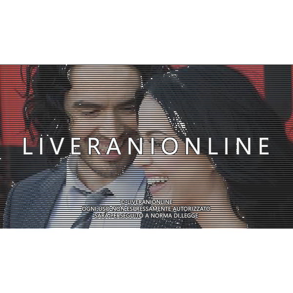 English comedian, actor, columnist, singer, author and radio/television presenter Russell Brand and American singer and songwriter Katy Perry attend the Arthur UK Premiere at the O2 Arena on Tuesday, April 19, 2011 in London, England. AG. ALDO LIVERANI SAS ITALY ONLY *** Local Caption *** .