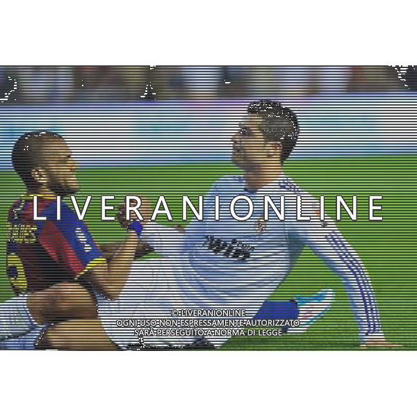 (110421) -- VALENCIA, April 21, 2011 () -- Real Madrid\'s Cristiano Ronaldo(R) shakes hands with Barcelona\'s Dani Alves during their King\'s Cup final soccer match at Mestalla stadium in Valencia, Spain, April 20, 2011. Real Madrid claimed the champion by defeating Barcelona 1-0. (/Chen Haitong) (xm) ©photoshot/Agenzia Aldo Liverani Sas - ITALY ONLY - Real Madrid - Barcellona finale della Coppa del Re allo stadio Mestalla di Valencia, in Spagna, 20 aprile 2011. Real Madrid, ha vinto sconfiggendo Barcellona 1-0.