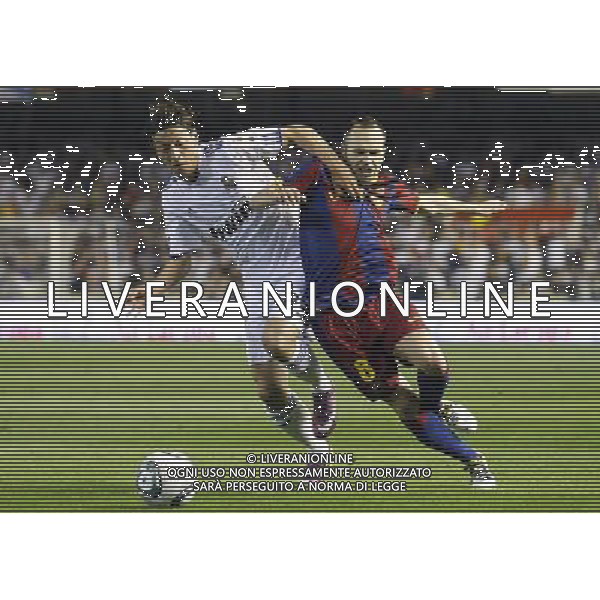 FC Barcelona\'s Andres Iniesta (r) and Real Madrid\'s Mesut Ozil (l) during King\'s Cup 2001 Final match.April 20,2011. (ALTERPHOTOS/Acero) ALDO LIVERANI S A S ONLY ITALY