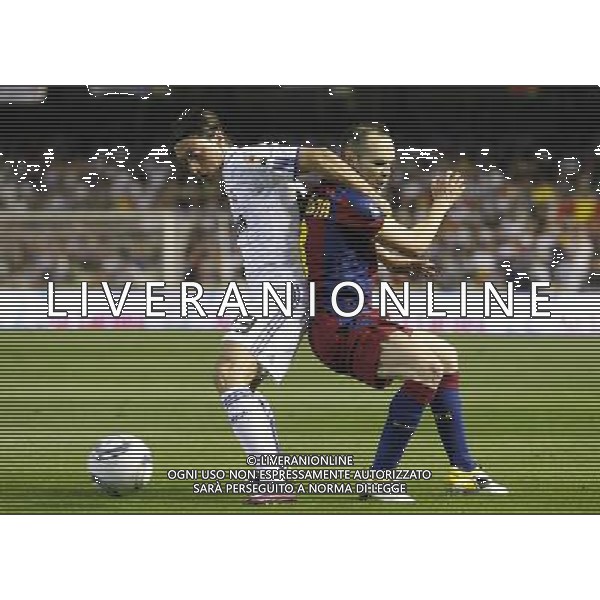 FC Barcelona\'s Andres Iniesta (r) and Real Madrid\'s Mesut Ozil (l) during King\'s Cup 2001 Final match.April 20,2011. (ALTERPHOTOS/Acero) ALDO LIVERANI S A S ONLY ITALY