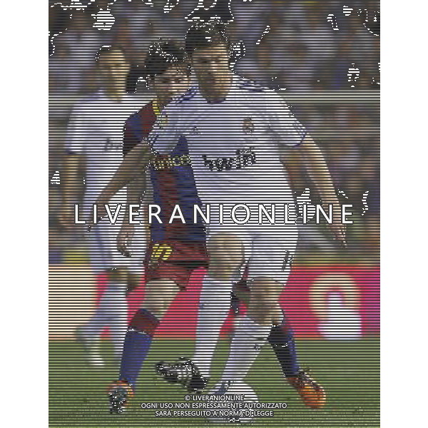 FC Barcelona\'s Leo Messi (b) and Real Madrid\'s Xabi Alonso (f) during King\'s Cup 2001 Final match.April 20,2011. (ALTERPHOTOS/Acero) ALDO LIVERANI S A S ONLY ITALY