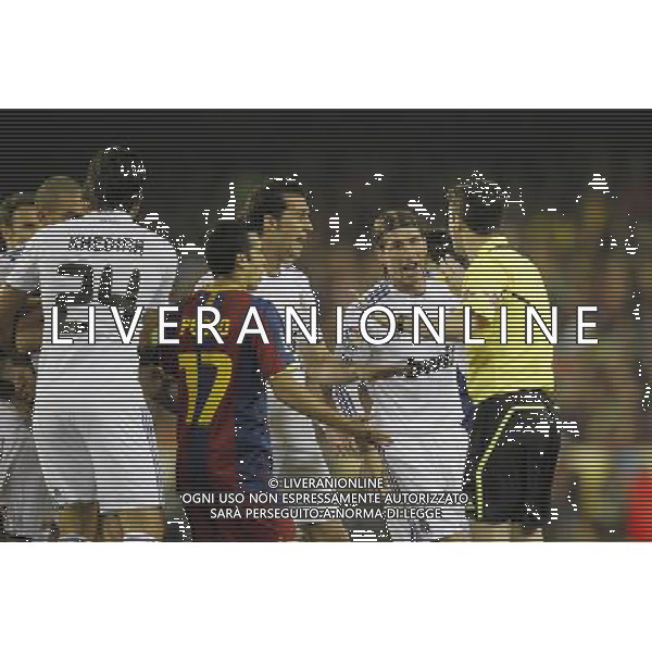 Real Madrid\'s players and FC Barcelona\'s players have words with the referee during la Spain King\'s Cup Final match in Valencia, Spain on April 20th 2011. Photo: Cesar Cebolla / ALFAQUI ALDO LIVERANI S A S ONLY ITALY