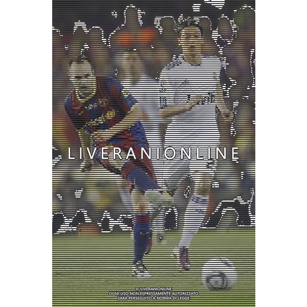 Real Madrid\'s Mesut Ozil vs Barcelona\'s Andres Iniesta during Spain\'s King\'s Cup Final match in Valencia, Spain on April 20th 2011. Photo: Cesar Cebolla / ALFAQUI ALDO LIVERANI S A S ONLY ITALY