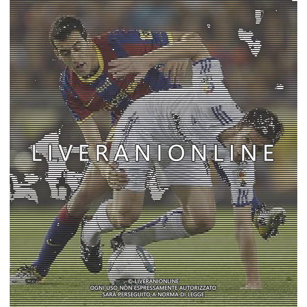 Real Madrid\'s Xabi Alonso vs Barcelona\'s Sergio Busquets during Spain\'s King\'s Cup Final match in Valencia, Spain on April 20th 2011. Photo: Cesar Cebolla / ALFAQUI ALDO LIVERANI S A S ONLY ITALY