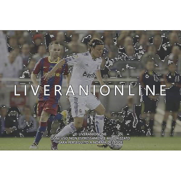 Real Madrid\'s Mesut Ozil and FC Barcelona\'s Andres Iniesta during la Spain King\'s Cup Final match in Valencia, Spain on April 20th 2011. Photo: Cesar Cebolla / ALFAQUI ALDO LIVERANI S A S ONLY ITALY