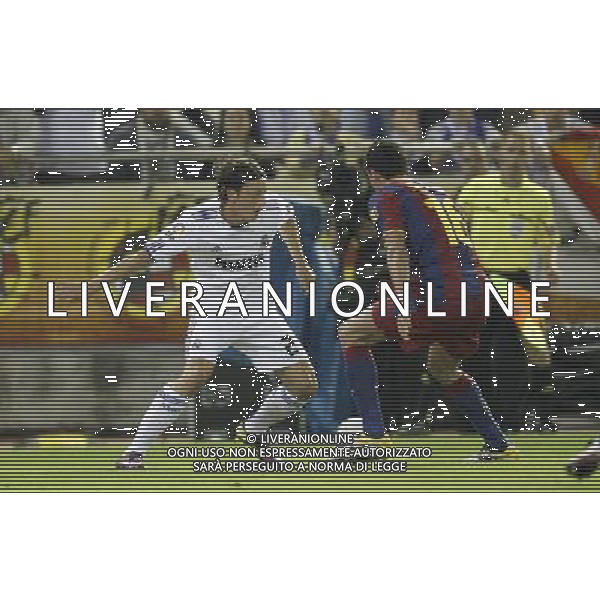 Real Madrid\'s Mesut Ozil and FC Barcelona\'s Sergio Busquets during la Spain King\'s Cup Final match in Valencia, Spain on April 20th 2011. Photo: Cesar Cebolla / ALFAQUI ALDO LIVERANI S A S ONLY ITALY