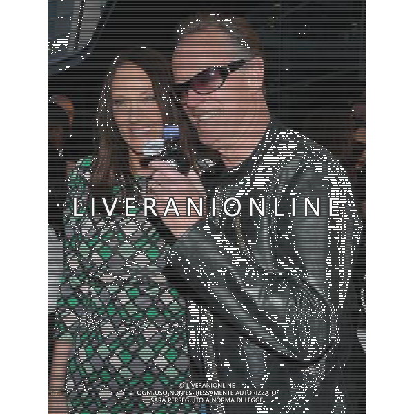 Peter Fonda and date Parky DeVogelaere Photo by Gilbert Flores \'Pom Wonderful Presents: The Greatest Movie Ever Sold\' at the ArcLight Cinemas Cinerama Dome April 20, 2011 - Hollywood, California AG. ALDO LIVERANI SAS ITALY ONLY *** Local Caption *** .