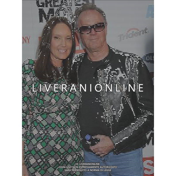 Peter Fonda and date Parky DeVogelaere Photo by Gilbert Flores \'Pom Wonderful Presents: The Greatest Movie Ever Sold\' at the ArcLight Cinemas Cinerama Dome April 20, 2011 - Hollywood, California AG. ALDO LIVERANI SAS ITALY ONLY *** Local Caption *** .
