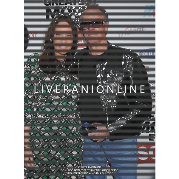 Peter Fonda and date Parky DeVogelaere Photo by Gilbert Flores \'Pom Wonderful Presents: The Greatest Movie Ever Sold\' at the ArcLight Cinemas Cinerama Dome April 20, 2011 - Hollywood, California AG. ALDO LIVERANI SAS ITALY ONLY *** Local Caption *** .