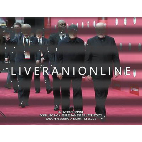 (110423) -- BEIJING, April 23, 2011 -- Director of Venice International Film Festival Marco Muller (1st R) walks on the red carpet prior to the Beijing International Film Festival in Beijing, capital of China, April 23, 2011. The film festival will be held from April 23 to April 28, including a series of film-related activities such as film music concert and \'Film Magic Beijing\' forum. Luo Xiaoguang) (xzj) AG ALDO LIVERANI ONLY ITALY