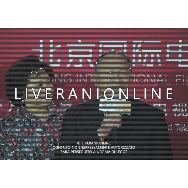 (110423) -- BEIJING, April 23, 2011 -- Director John Woo (R) are seen prior to the Beijing International Film Festival in Beijing, capital of China, April 23, 2011. The film festival will be held from April 23 to April 28, including a series of film-related activities such as film music concert and \'Film Magic Beijing\' forum. Luo Xiaoguang) (xzj) AG ALDO LIVERANI ONLY ITALY