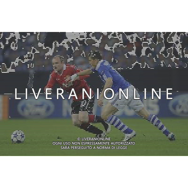 firo : Fu§ball,Fussball, 26.04.2011 CL, Champions League, Halbfinale Hinspiel, Saison 2010/2011 FC Schalke 04 - Man U, Manchester United ROONEY gegen PAPADOPOULOS $worldrightsEs gelten unsere AGB, einsehbar auf www.firosportphoto.de copyright by firo sportphoto: Pfefferackerstr. 2aÊ 45894 G e l s e n k i r c h e n www.firosportphoto.de mail@firosportphoto.de (V o l k s b a n k B o c h u m - W i t t e n ) BLZ.: 430 601 29 Kt. Nr.: 341 117 100 Tel:Ê 0209 - 9304402 Fax:Ê 0209 - 9304443 AG ALDO LIVERANI ONLY ITALY