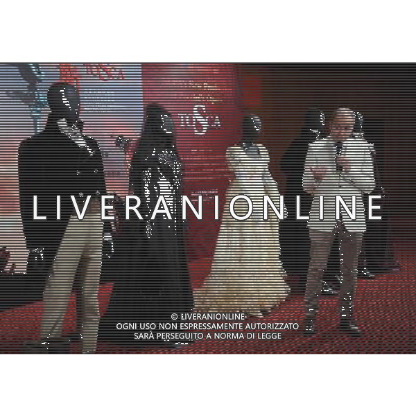 BEIJING, April 26, 2011 Costume designer Jesus Ruiz introduces characters of costumes of the opera \'Tosca\' at the National Center for the Performing Arts in Beijing, capital of China, April 26, 2011. Director Giancarlo Del Monaco, costume designer Jesus Ruiz and five performers of Puccini\'s opera \'Tosca\' participated in the costume show here on Tuesday. The opera will be on shown from May 12 to 15. (/Luo Xiaoguang) (mcg) ©photoshot/Agenzia Aldo Liverani Sas - ITALY ONLY - La costumista Gesu\' Ruiz e cinque esecutori dell\'opera teatrale di Puccini \'Tosca\' durante la mostra dei costumi presso il Centro Nazionale per le Arti dello Spettacolo a Pechino, capitale della Cina, 26 aprile 2011.