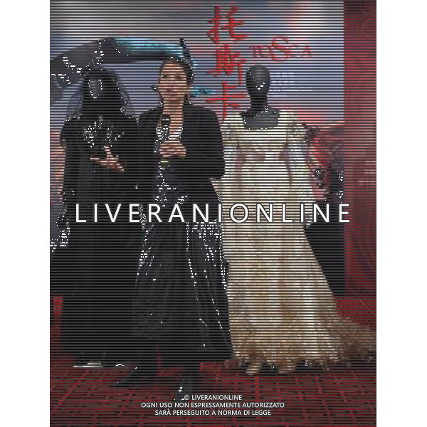 BEIJING, April 26, 2011 Actress Nicola Beller Carbone introduces her costumes during a dress show of the opera \'Tosca\' at the National Center for the Performing Arts in Beijing, capital of China, April 26, 2011. Director Giancarlo Del Monaco, costume designer Jesus Ruiz and five performers of Puccini\'s opera \'Tosca\' participated in the costume show here on Tuesday. The opera will be on shown from May 12 to 15. (/Luo Xiaoguang) (mcg) ©photoshot/Agenzia Aldo Liverani Sas - ITALY ONLY - La costumista Gesu\' Ruiz e cinque esecutori dell\'opera teatrale di Puccini \'Tosca\' durante la mostra dei costumi presso il Centro Nazionale per le Arti dello Spettacolo a Pechino, capitale della Cina, 26 aprile 2011.