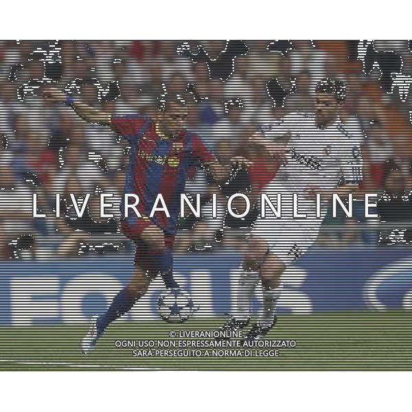 Real Madrid\'s Xabi Alonso and Barcelona\'s Daniel Alves during Champions League semifinal first match on April 27 2011. Photo: Cesar Cebolla / ALFAQUI AG ALDO LIVERANI S A S ONLY ITALY