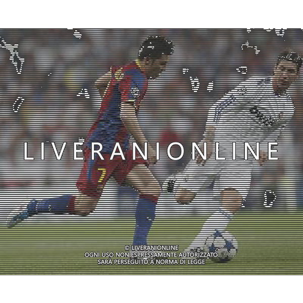 Real Madrid\'s Sergio Ramos and Barcelona\'s David Villa during Champions League semifinal first match on April 27 2011. Photo: Cesar Cebolla / ALFAQUI AG ALDO LIVERANI S A S ONLY ITALY