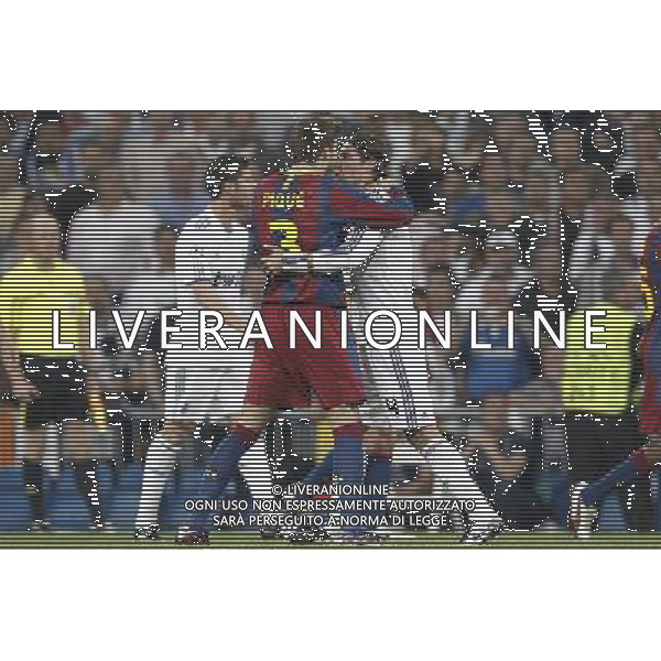 Real Madrid\'s Sergio Ramos and Barcelona\'s Gerard Pique during Champions League semifinal first match on April 27 2011. Photo: Cesar Cebolla / ALFAQUI AG ALDO LIVERANI S A S ONLY ITALY