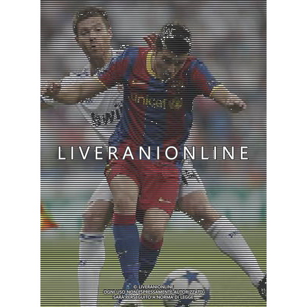 Real Madrid\'s Xabi Alonso and Barcelona\'s David Villa during Champions League semifinal first match on April 27 2011. Photo: Cesar Cebolla / ALFAQUI AG ALDO LIVERANI S A S ONLY ITALY