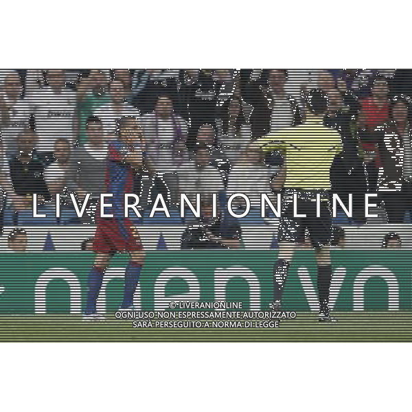 Barcelona\'s Daniel Alves yellow card during Champions League semifinal first match on April 27 2011. Photo: Cesar Cebolla / ALFAQUI AG ALDO LIVERANI S A S ONLY ITALY