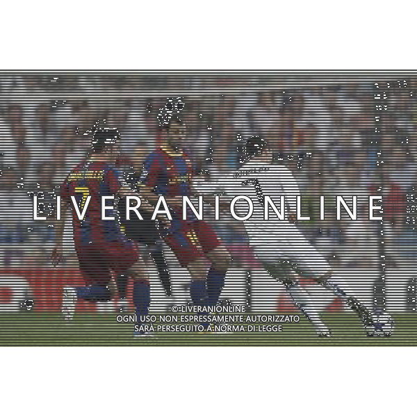 Real Madrid\'s Cristiano Ronaldo and Barcelona\'s Javier Mascherano and David Villa during Champions League semifinal first match on April 27 2011. Photo: Cesar Cebolla / ALFAQUI AG ALDO LIVERANI S A S ONLY ITALY