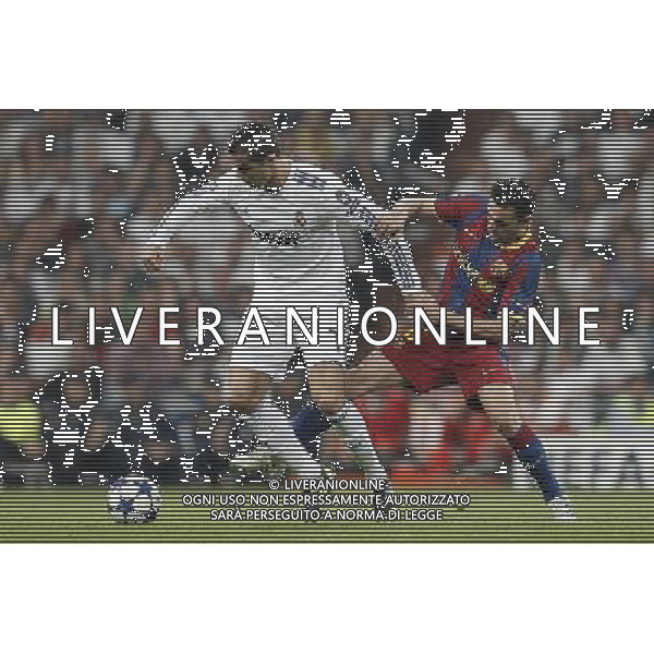 Real Madrid\'s Cristiano Ronaldo and Barcelona\'s Xavi Hernandez during Champions League semifinal first match on April 27 2011. Photo: Cesar Cebolla / ALFAQUI ag aldo liverani only italy
