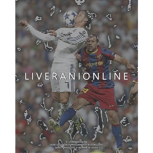 Real Madrid\'s Cristiano Ronaldo and Barcelona\'s Javier Mascherano during Champions League semifinal first match on April 27 2011. Photo: Cesar Cebolla / ALFAQUI ag aldo liverani only italy