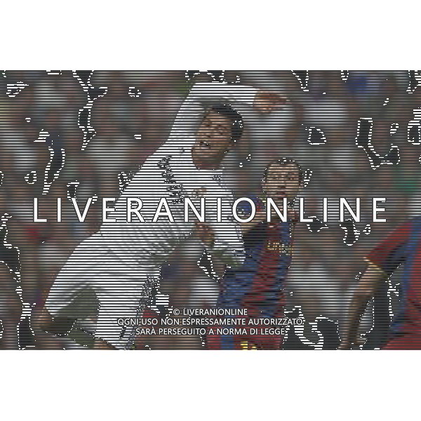 Real Madrid\'s Cristiano Ronaldo and Barcelona\'s Javier Mascherano during Champions League semifinal first match on April 27 2011. Photo: Cesar Cebolla / ALFAQUI ag aldo liverani only italy