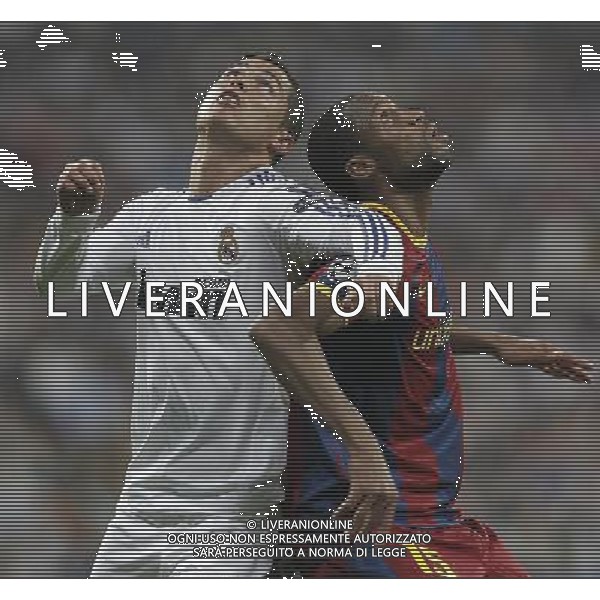 Real Madrid\'s Cristiano Ronaldo and Barcelona\'s Seydou Keita during Champions League semifinal first match on April 27 2011. Photo: Cesar Cebolla / ALFAQUI aldo liverani s a s only italy