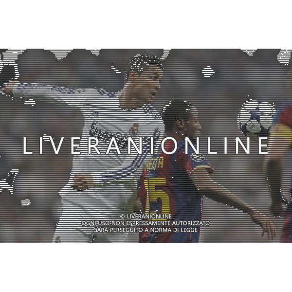 Real Madrid\'s Cristiano Ronaldo and Barcelona\'s Seydou Keita during Champions League semifinal first match on April 27 2011. Photo: Cesar Cebolla / ALFAQUI aldo liverani s a s only italy